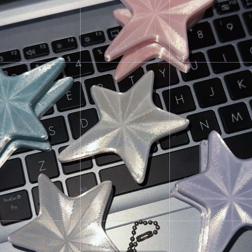 حامل كابلات على شكل نجمة ثلاثي - مراجعة Cable Winder Keychain وسعره